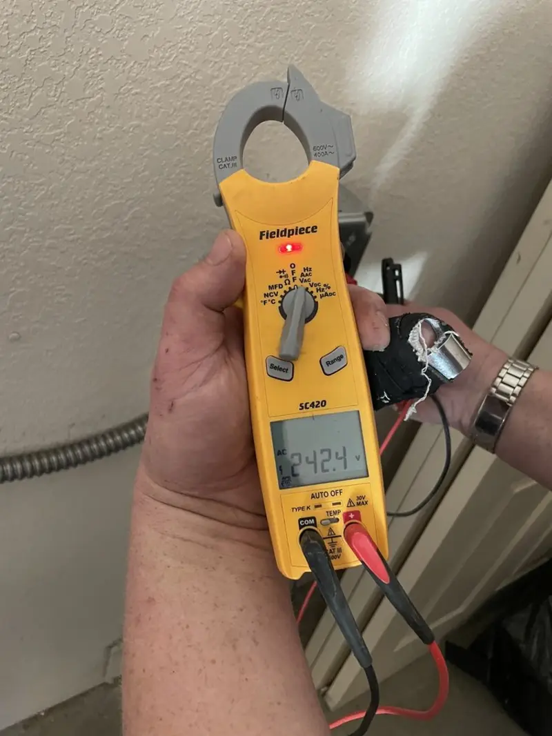 Voltage testing with clamp meter during Aluminum Wiring Replacement in Taymouth